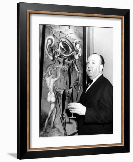 Film Director Alfred Hitchcock, Standing Beside Salvador Dali's Painting "Movies"-Herbert Gehr-Framed Premium Photographic Print