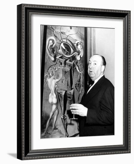 Film Director Alfred Hitchcock, Standing Beside Salvador Dali's Painting "Movies"-Herbert Gehr-Framed Premium Photographic Print