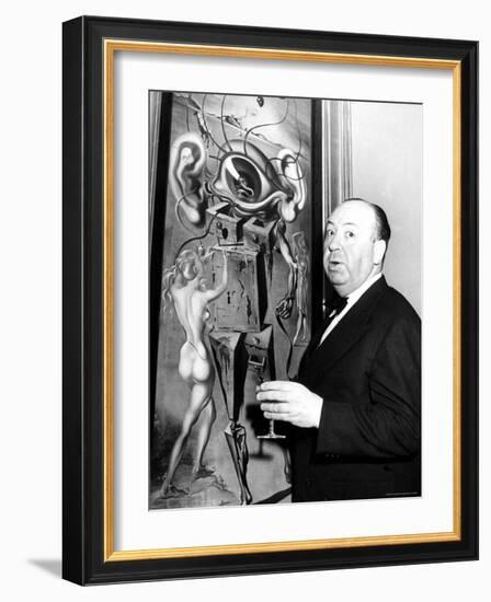 Film Director Alfred Hitchcock, Standing Beside Salvador Dali's Painting "Movies"-Herbert Gehr-Framed Premium Photographic Print