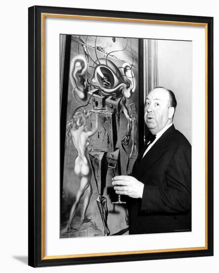 Film Director Alfred Hitchcock, Standing Beside Salvador Dali's Painting "Movies"-Herbert Gehr-Framed Premium Photographic Print