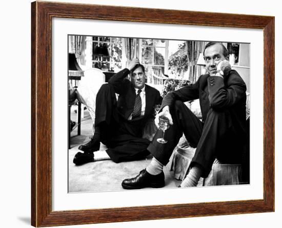 Film Director Carol Reed and Author Graham Greene Sitting on the Floor with Wine Glasses-Larry Burrows-Framed Premium Photographic Print