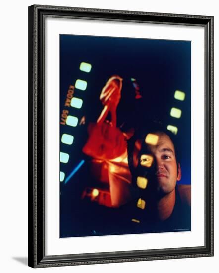 Film Director Quentin Tarantino Framed by Projected Clip From His Movie "Pulp Fiction"-Ted Thai-Framed Premium Photographic Print