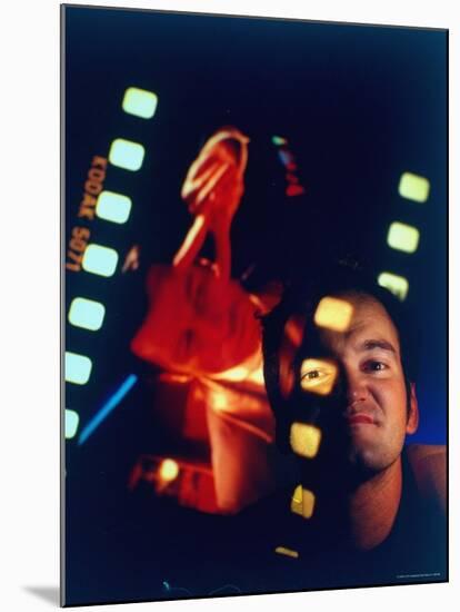 Film Director Quentin Tarantino Framed by Projected Clip From His Movie "Pulp Fiction"-Ted Thai-Mounted Premium Photographic Print