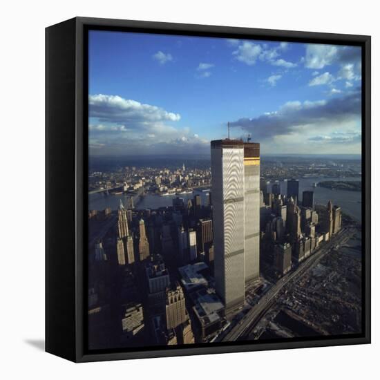 Financial District with World Trade Center's Twin Towers Dwarfing Rest of Wall Street Buildings-Henry Groskinsky-Framed Premier Image Canvas