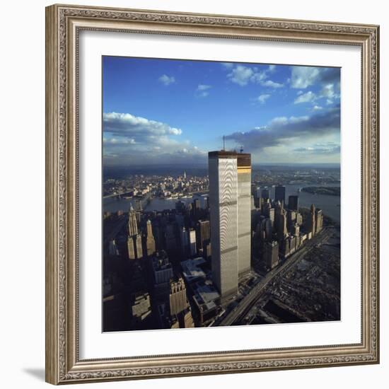 Financial District with World Trade Center's Twin Towers Dwarfing Rest of Wall Street Buildings-Henry Groskinsky-Framed Photographic Print