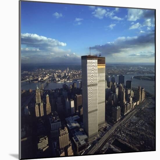 Financial District with World Trade Center's Twin Towers Dwarfing Rest of Wall Street Buildings-Henry Groskinsky-Mounted Photographic Print