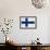 Finland Flag Design with Wood Patterning - Flags of the World Series-Philippe Hugonnard-Framed Art Print displayed on a wall