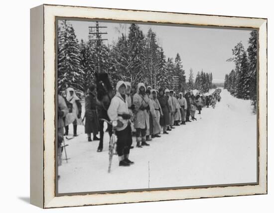 Finnish Soldiers Lining Up in the Snow During War with Russia-Carl Mydans-Framed Premier Image Canvas