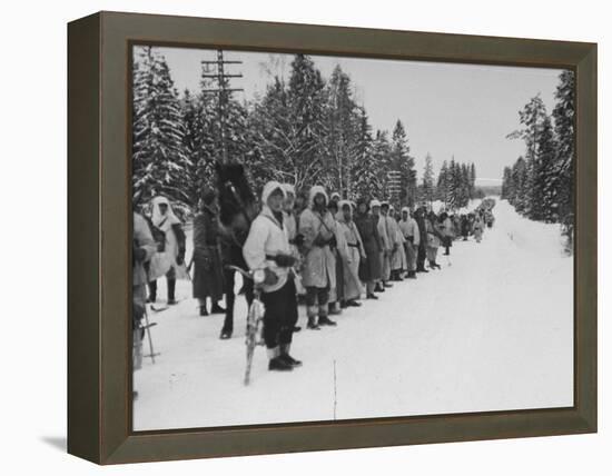 Finnish Soldiers Lining Up in the Snow During War with Russia-Carl Mydans-Framed Premier Image Canvas