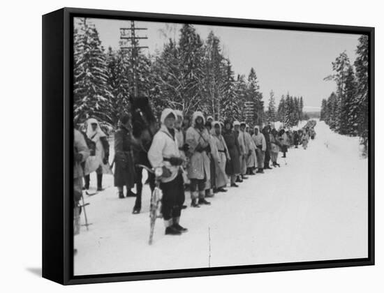Finnish Soldiers Lining Up in the Snow During War with Russia-Carl Mydans-Framed Premier Image Canvas