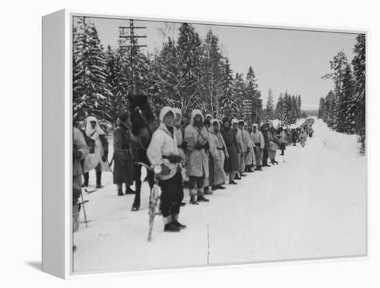 Finnish Soldiers Lining Up in the Snow During War with Russia-Carl Mydans-Framed Premier Image Canvas