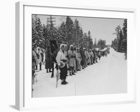 Finnish Soldiers Lining Up in the Snow During War with Russia-Carl Mydans-Framed Premium Photographic Print