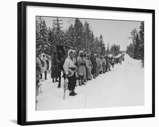 Finnish Soldiers Lining Up in the Snow During War with Russia-Carl Mydans-Framed Premium Photographic Print