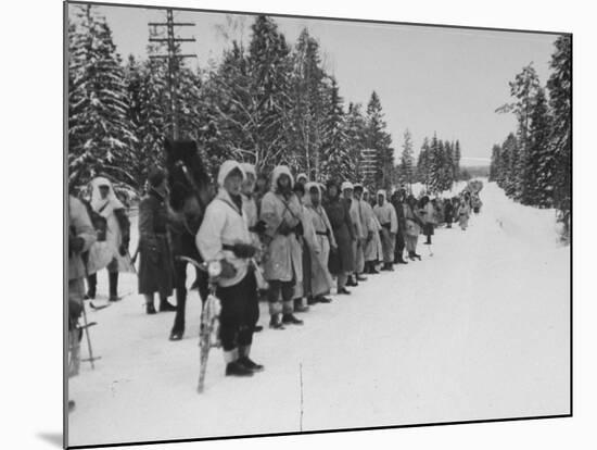 Finnish Soldiers Lining Up in the Snow During War with Russia-Carl Mydans-Mounted Premium Photographic Print