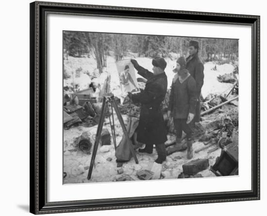 Finnish Soldiers Looking at a Patriotic Poster Left Behind by Defeated Russian Troops-Carl Mydans-Framed Premium Photographic Print