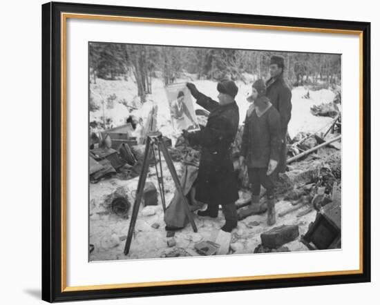 Finnish Soldiers Looking at a Patriotic Poster Left Behind by Defeated Russian Troops-Carl Mydans-Framed Premium Photographic Print