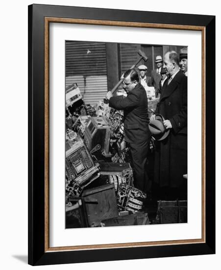 Fiorello La Guardia (1882-1947) Smashing Confiscated Slot Machines, 1934 (B/W Photo)-American Photographer-Framed Giclee Print