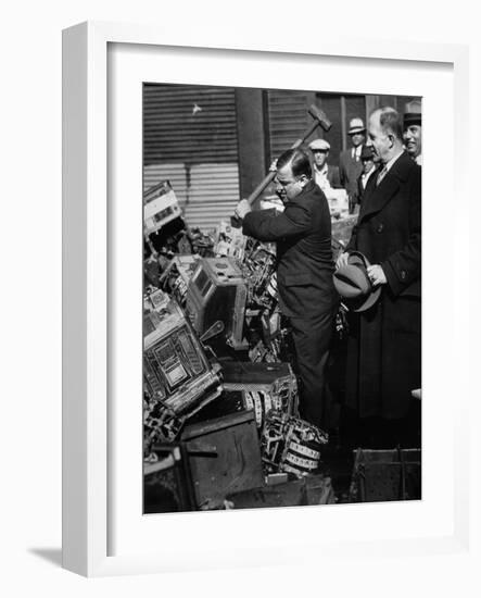 Fiorello La Guardia (1882-1947) Smashing Confiscated Slot Machines, 1934 (B/W Photo)-American Photographer-Framed Giclee Print