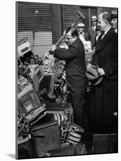 Fiorello La Guardia (1882-1947) Smashing Confiscated Slot Machines, 1934 (B/W Photo)-American Photographer-Mounted Giclee Print