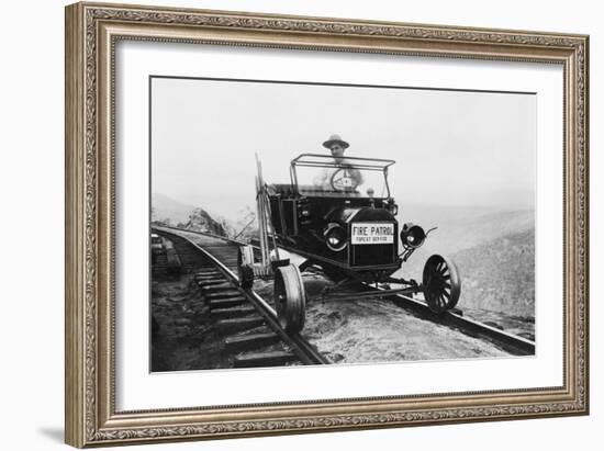 Fire Patrol Rides Steel Wheeled Car over Railroad Tracks-null-Framed Art Print