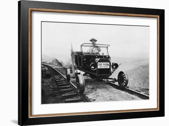 Fire Patrol Rides Steel Wheeled Car over Railroad Tracks-null-Framed Art Print