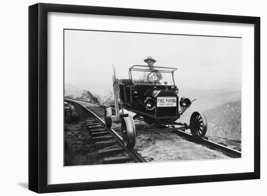 Fire Patrol Rides Steel Wheeled Car over Railroad Tracks-null-Framed Art Print