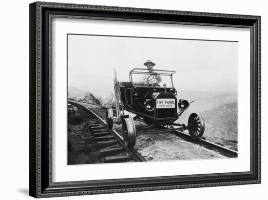 Fire Patrol Rides Steel Wheeled Car over Railroad Tracks-null-Framed Art Print