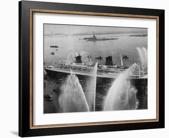 Fireboats Greeting the SS France, as It Enters the New York Harbor on Its Maiden Voyage-Ralph Morse-Framed Photographic Print