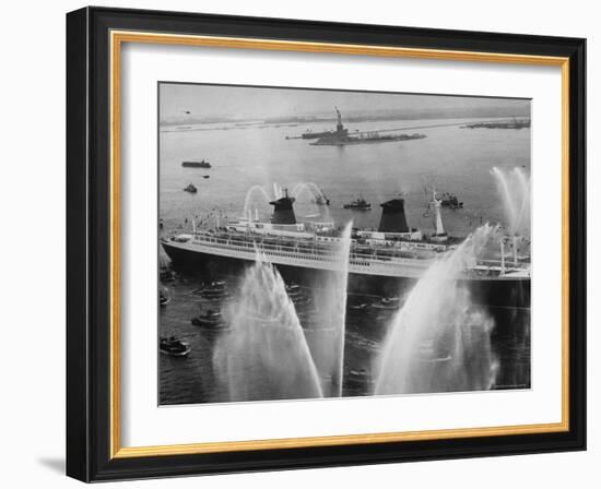 Fireboats Greeting the SS France, as It Enters the New York Harbor on Its Maiden Voyage-Ralph Morse-Framed Photographic Print