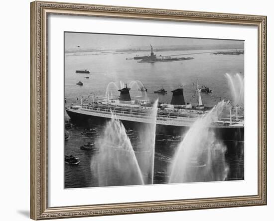 Fireboats Greeting the SS France, as It Enters the New York Harbor on Its Maiden Voyage-Ralph Morse-Framed Photographic Print