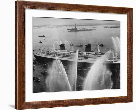 Fireboats Greeting the SS France, as It Enters the New York Harbor on Its Maiden Voyage-Ralph Morse-Framed Photographic Print