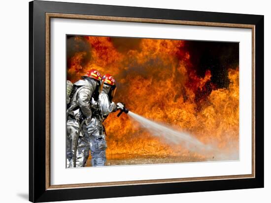 Firefighters Combat a Jp-8 Jet Fuel Fire-null-Framed Photographic Print