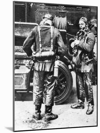 Firefighters Donning Smoke Helmets, Farringdon Street Rubber Works, London, 1926-1927-null-Mounted Giclee Print