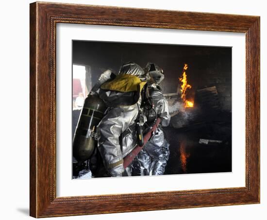 Firefighters Extinguish a Fire in a Training Room During Live Burn Training-Stocktrek Images-Framed Photographic Print
