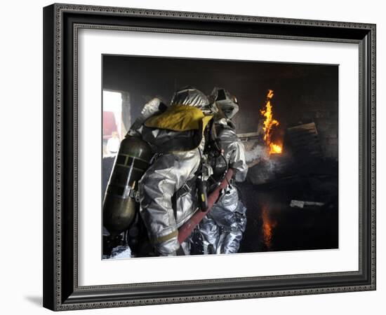 Firefighters Extinguish a Fire in a Training Room During Live Burn Training-Stocktrek Images-Framed Photographic Print