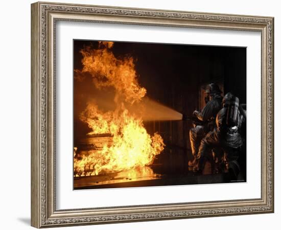 Firefighters Extinguishing a Simulated Battery Fire-Stocktrek Images-Framed Photographic Print