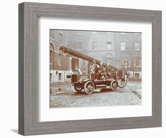 Firemen Aboard a Motor Fire Escape Vehicle, London Fire Brigade Headquarters, London, 1909-null-Framed Photographic Print