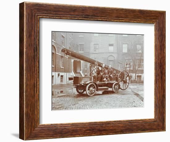 Firemen Aboard a Motor Fire Escape Vehicle, London Fire Brigade Headquarters, London, 1909-null-Framed Photographic Print