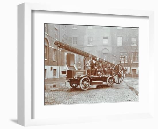 Firemen Aboard a Motor Fire Escape Vehicle, London Fire Brigade Headquarters, London, 1909-null-Framed Photographic Print