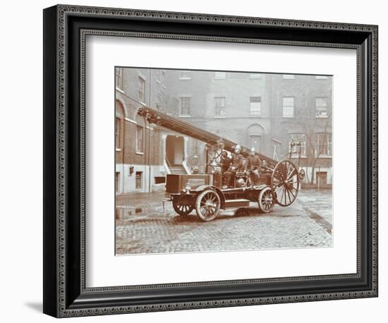 Firemen Aboard a Motor Fire Escape Vehicle, London Fire Brigade Headquarters, London, 1909-null-Framed Photographic Print