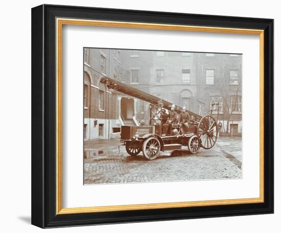 Firemen Aboard a Motor Fire Escape Vehicle, London Fire Brigade Headquarters, London, 1909-null-Framed Photographic Print