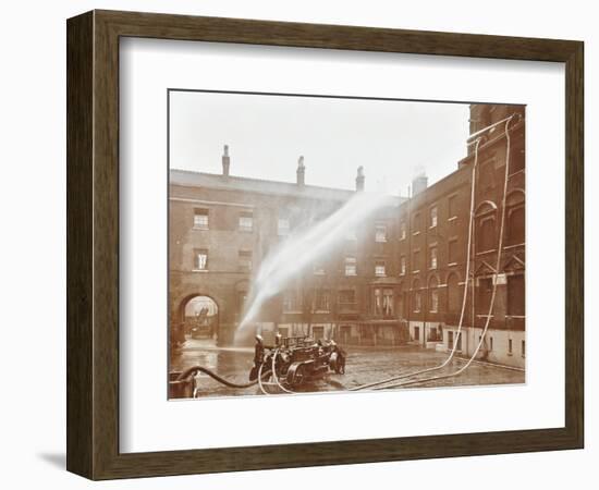 Firemen Demonstrating Hoses Worked by a Petrol Motor Pump, London Fire Brigade Headquarters, 1909-null-Framed Photographic Print