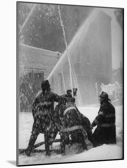 Firemen Fighting a Fire During Icy Weather-Al Fenn-Mounted Photographic Print