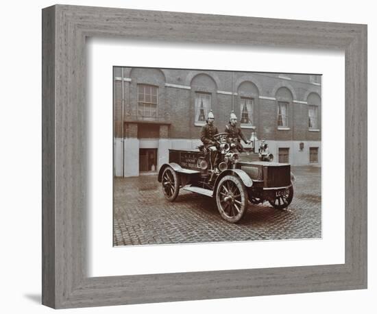 Firemen in Brass Helmets Aboard a Motor Hose Tender, London Fire Brigade Headquarters, London, 1909-null-Framed Photographic Print