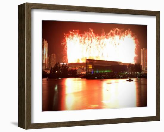 Fireworks are Seen over the BC Place after the Opening Ceremony for the Vancouver 2010 Olympics-null-Framed Photographic Print