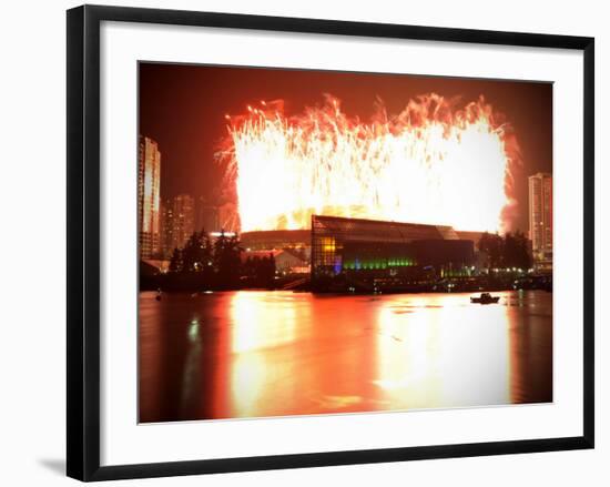 Fireworks are Seen over the BC Place after the Opening Ceremony for the Vancouver 2010 Olympics-null-Framed Photographic Print