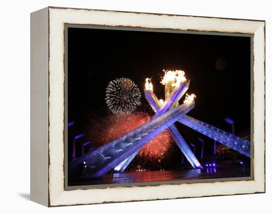 Fireworks Explode Behind the Olympic Flame at Opening Ceremony of Vancouver 2010 Winter Games-null-Framed Premier Image Canvas