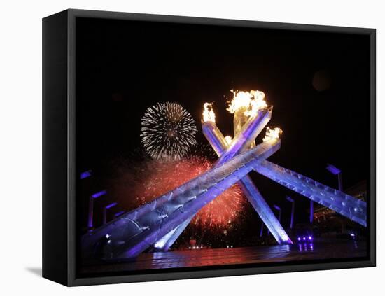 Fireworks Explode Behind the Olympic Flame at Opening Ceremony of Vancouver 2010 Winter Games-null-Framed Premier Image Canvas