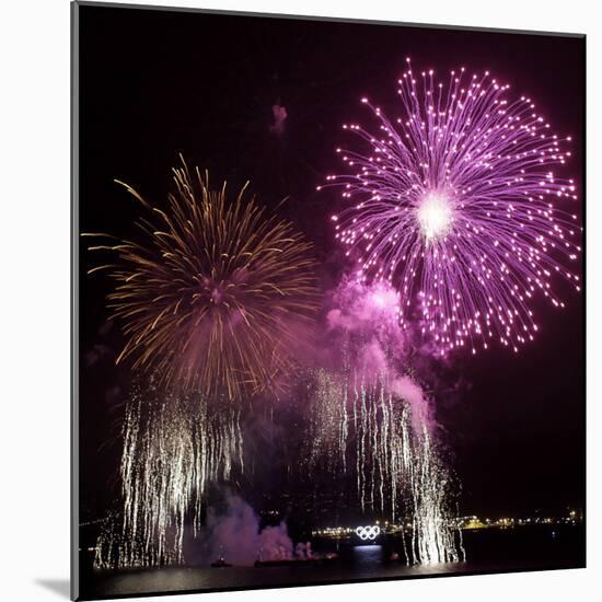 Fireworks Explode over the Olympic Rings During the Opening Ceremony of the Vancouver 2010 Olympics-null-Mounted Photographic Print