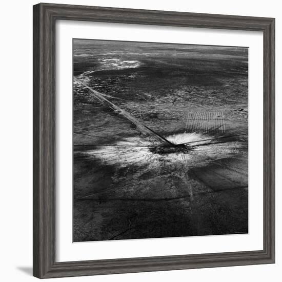 First Atomic Bomb's Dark Crater Surrounded by Glass Created by Heated Sand from Explosion-Fritz Goro-Framed Photographic Print